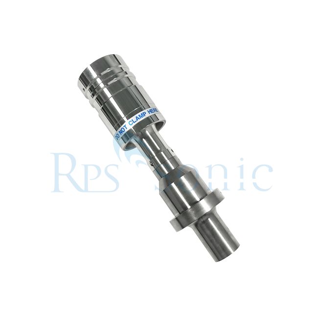 What is the function of the ultrasonic horn?